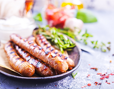 Astuces pour bien cuire des saucisses au four ou au barbecue